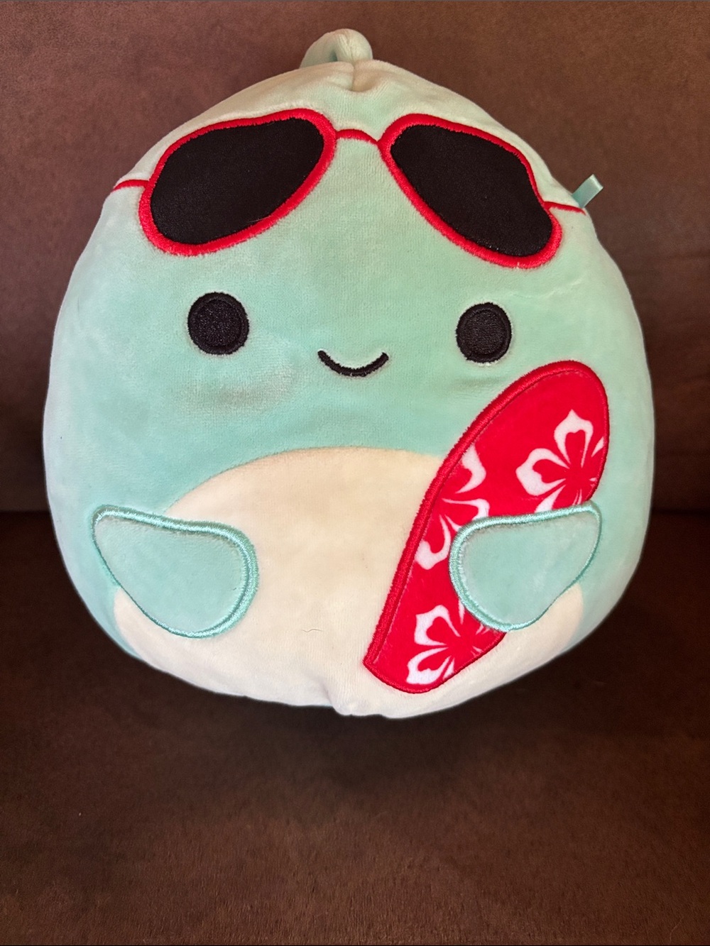 Squishmallows Mint Green Plush with Red Surfboard and Black Sunglasses